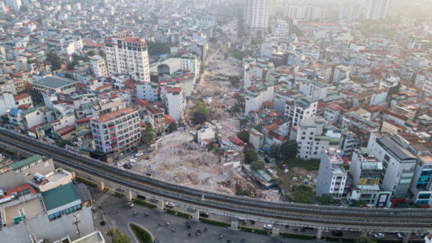 Máy móc san phẳng loạt công trình để làm đường Vành đai 2,5