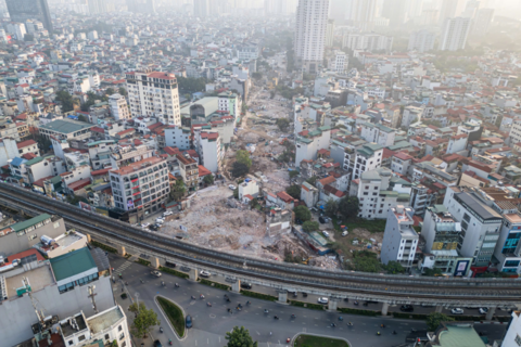 Máy móc san phẳng loạt công trình để làm đường Vành đai 2,5