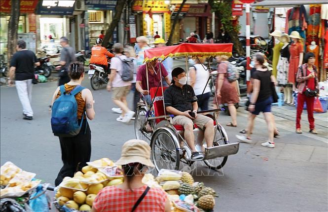 Xích lô - nét văn hóa du lịch Hà Nội - Ảnh 2.