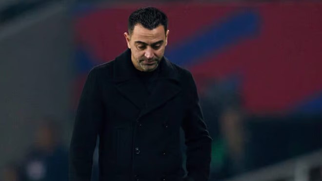 Rất khó để Xavi đổi ý ngay cả khi Barca giành được danh hiệu mùa này.  Ảnh: AFP