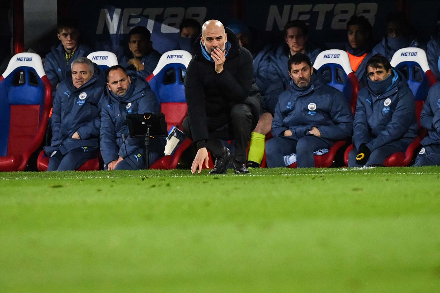Pep Guardiola không quá buồn sau khi thua Real Madrid. Ảnh: AFP