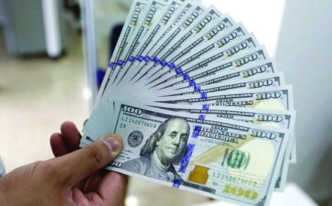 Đồng USD bứt phá sau gần một năm, thị trường toàn cầu chao đảo